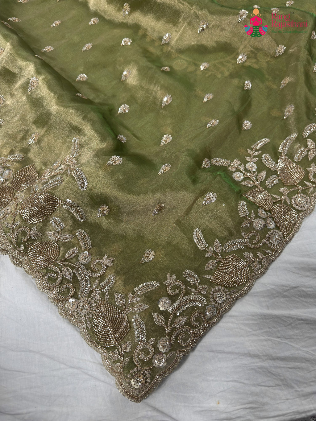 pallu detailing of green synthetic hand embellishment saree