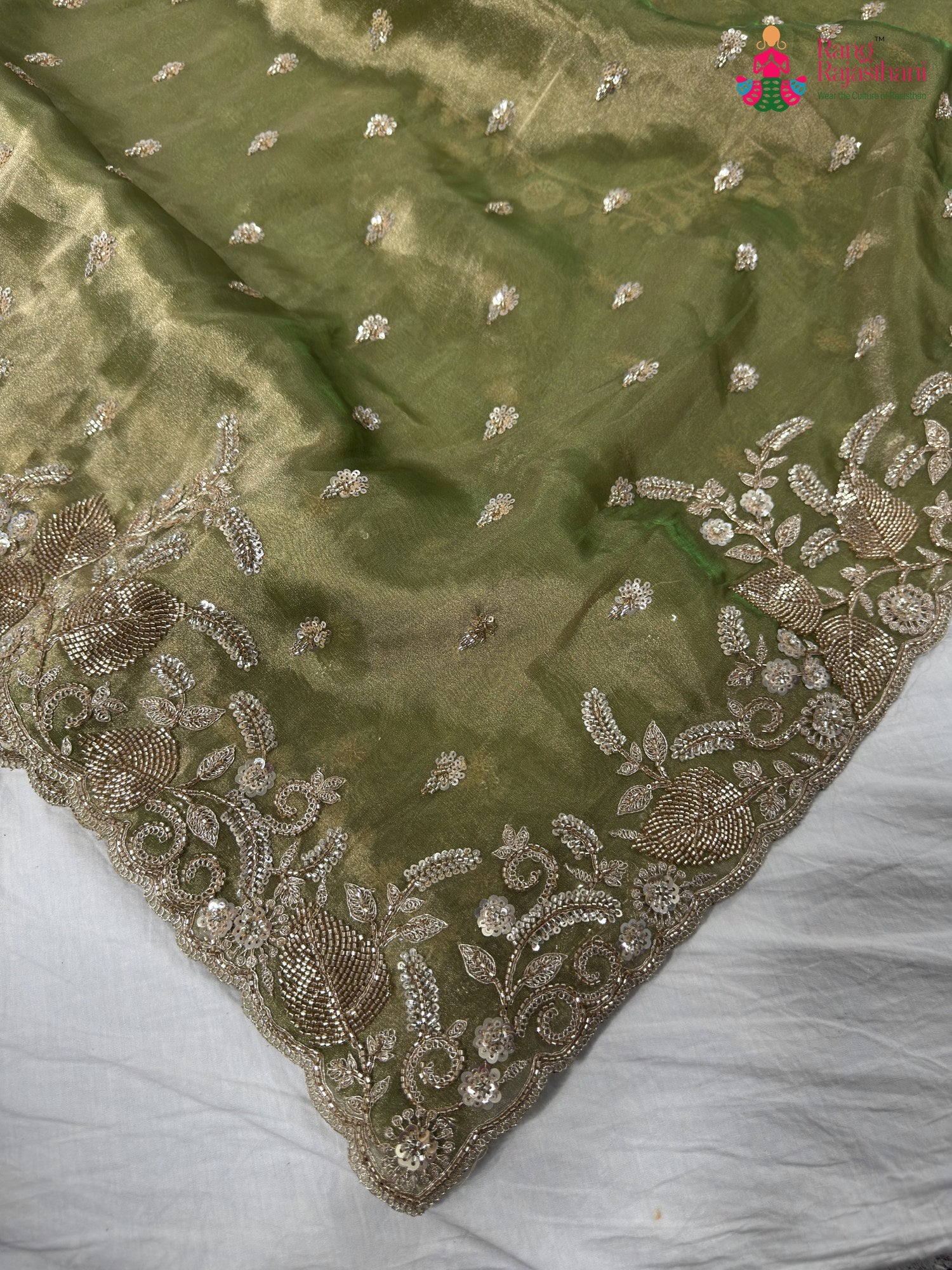pallu detailing of green synthetic hand embellishment saree
