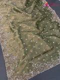 pallu detailing of green synthetic hand embellishment saree