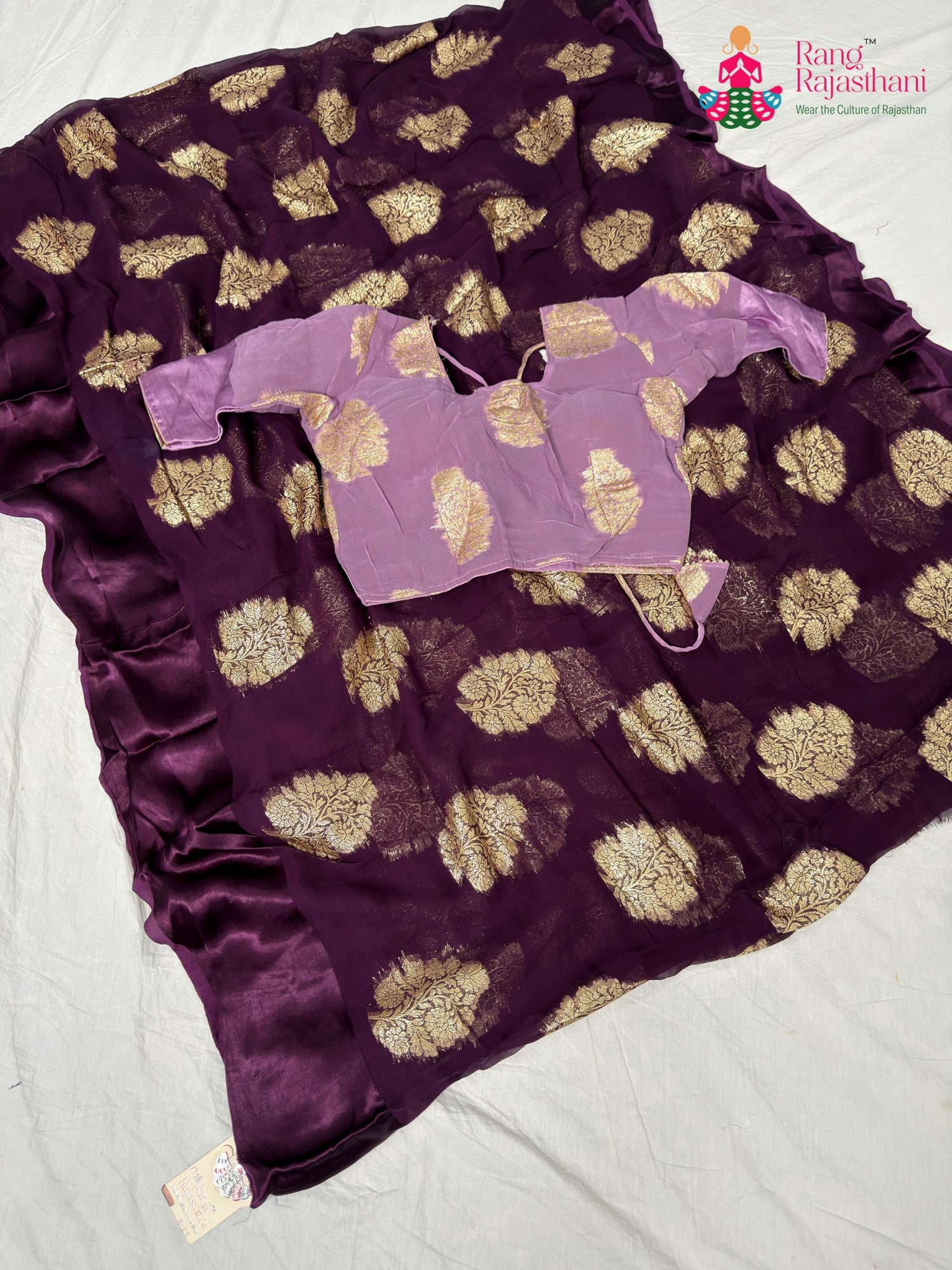 border detailing of handcrafted wine fabric saree