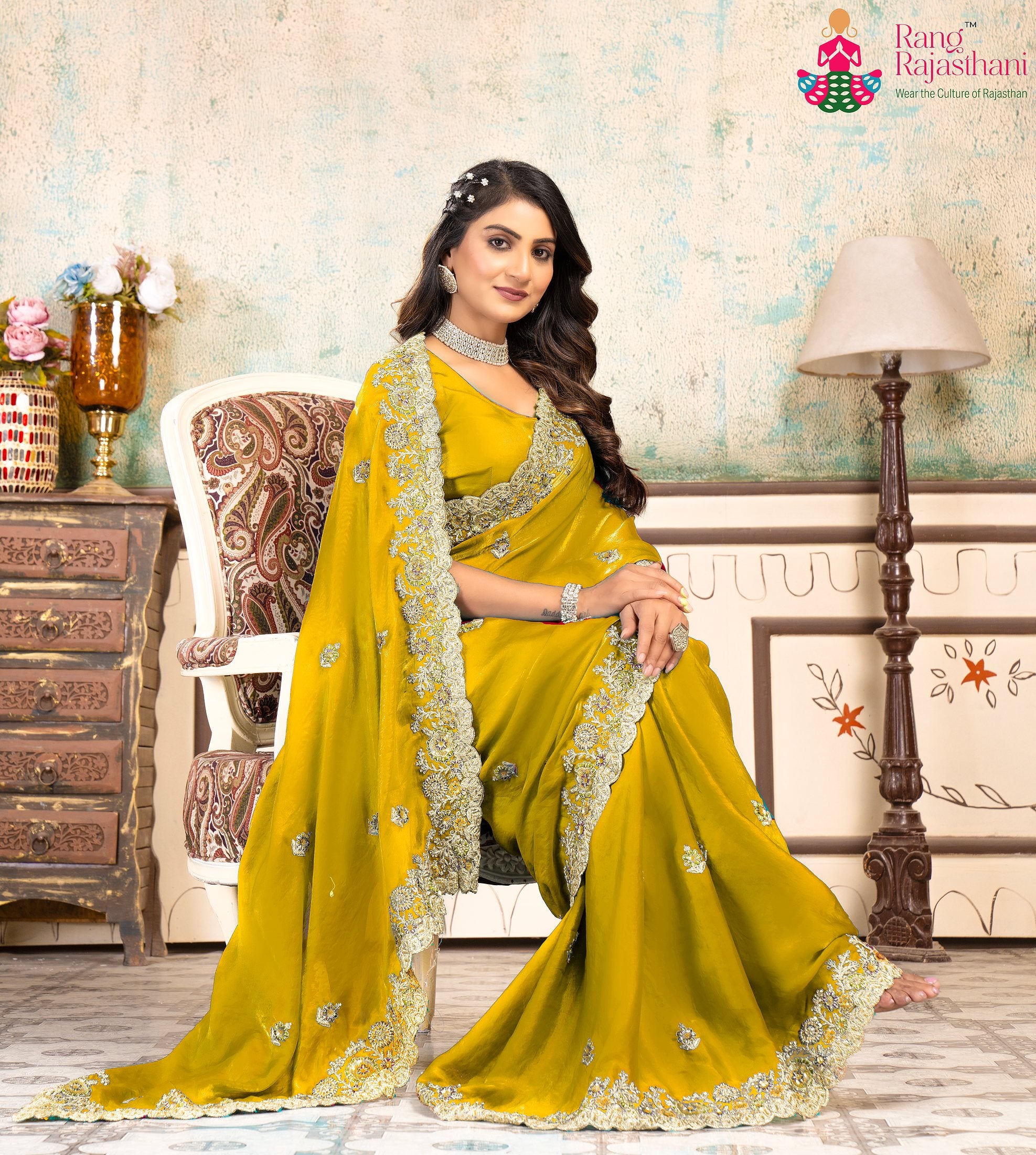 close up detailing of lightweight yellow chiffon saree 