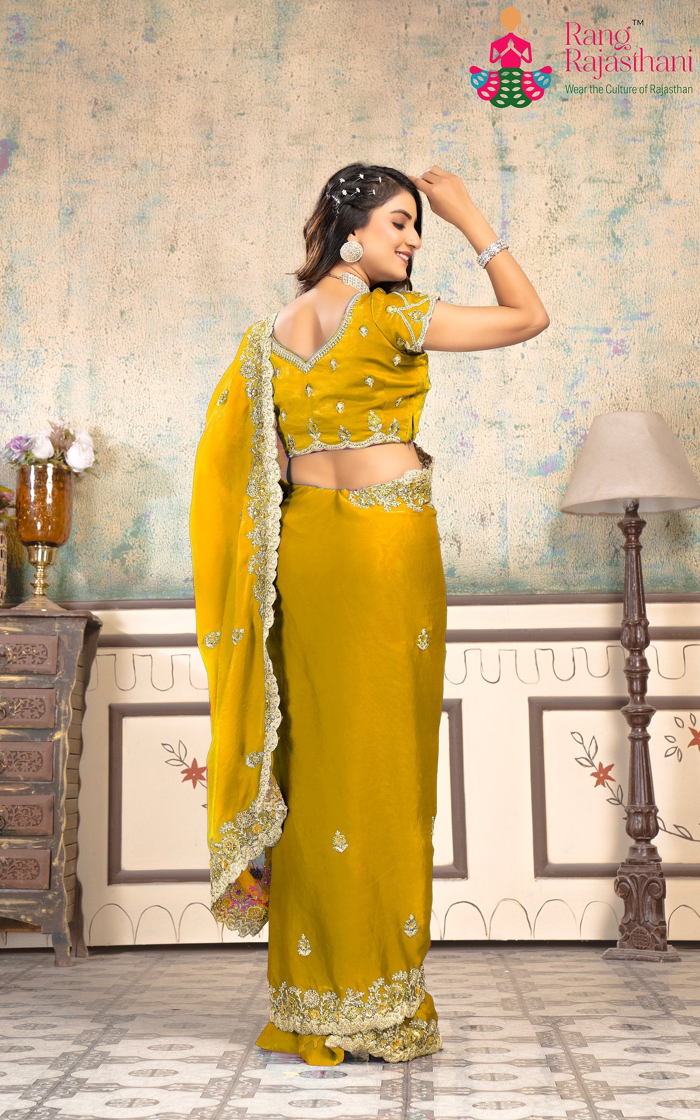 pallu detailing of lightweight yellow chiffon saree 