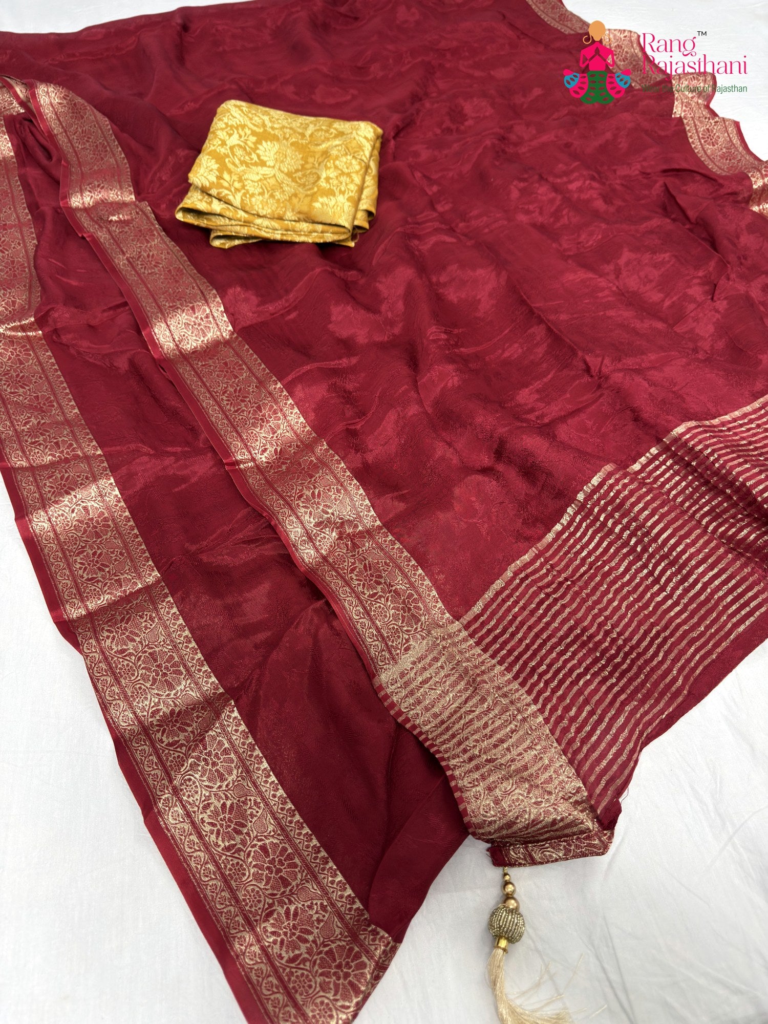 complete look of maroon chinnon jacquard weave saree