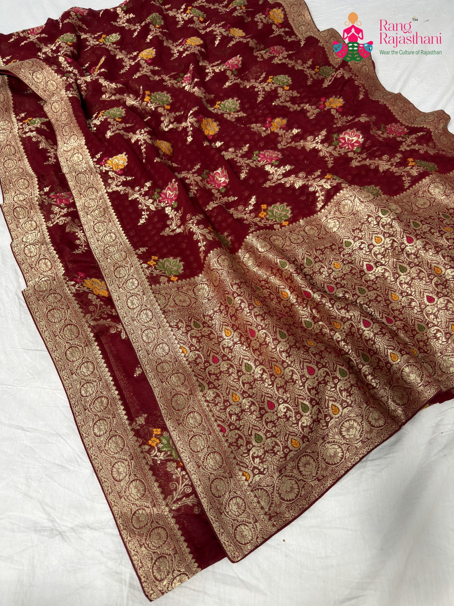 complete look of maharon soft georgette meenakari zari saree