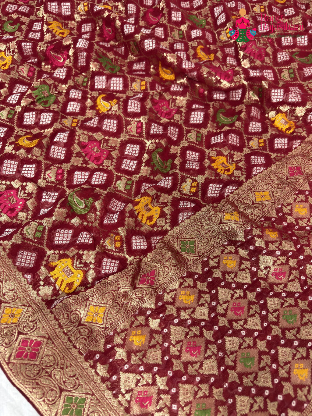 fabric texture of maroon pure georgette khaddi saree