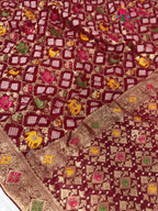 fabric texture of maroon pure georgette khaddi saree
