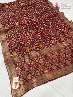 border detailing of maroon pure georgette khaddi saree