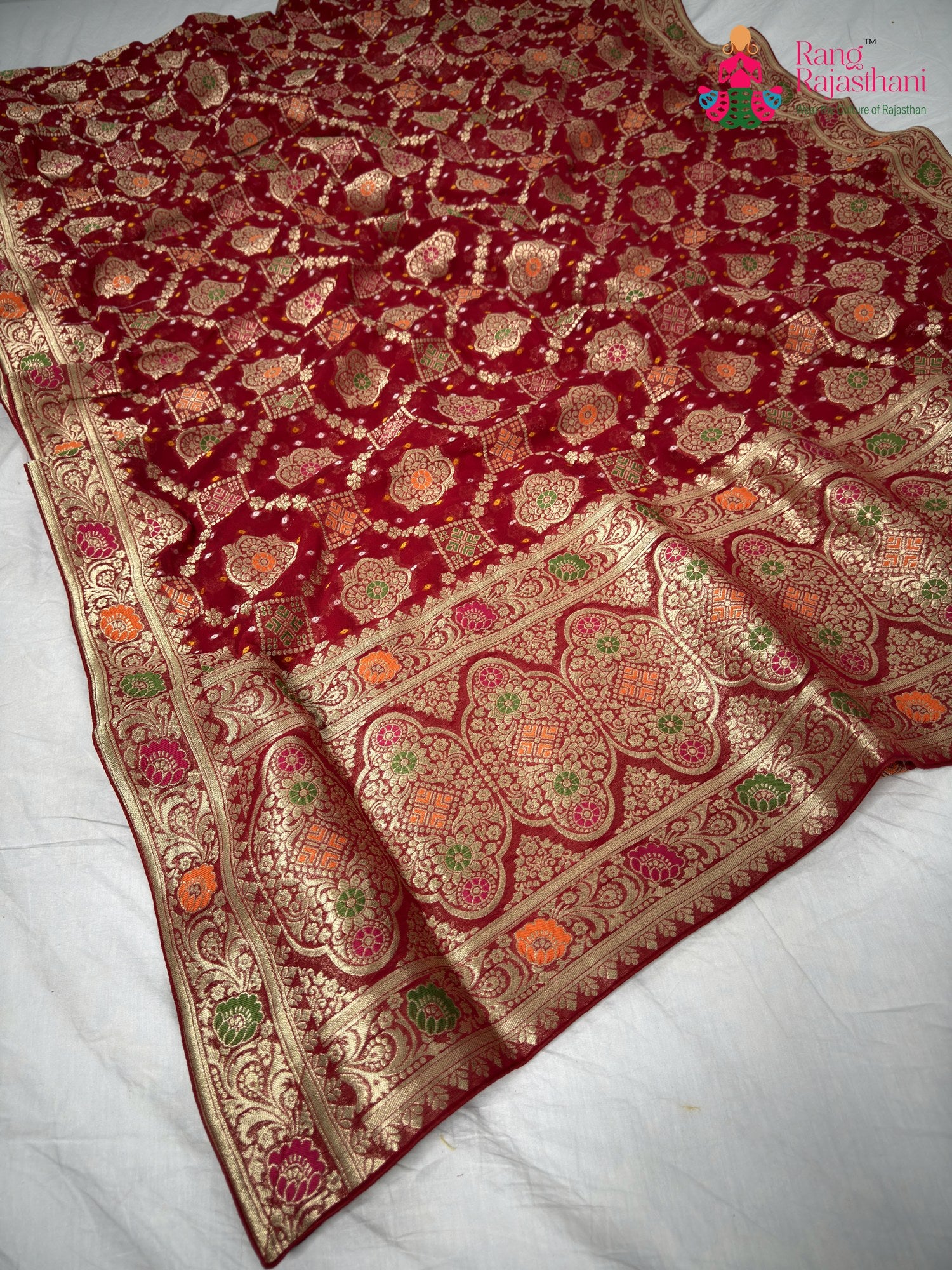 border detailing of maroon pure georgette khaddi saree