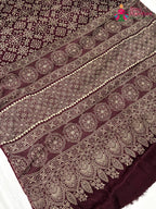 pallu detailing of maroon pure modal silk ajarakh print saree