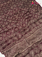 design pattern of maroon pure modal silk ajarakh print saree