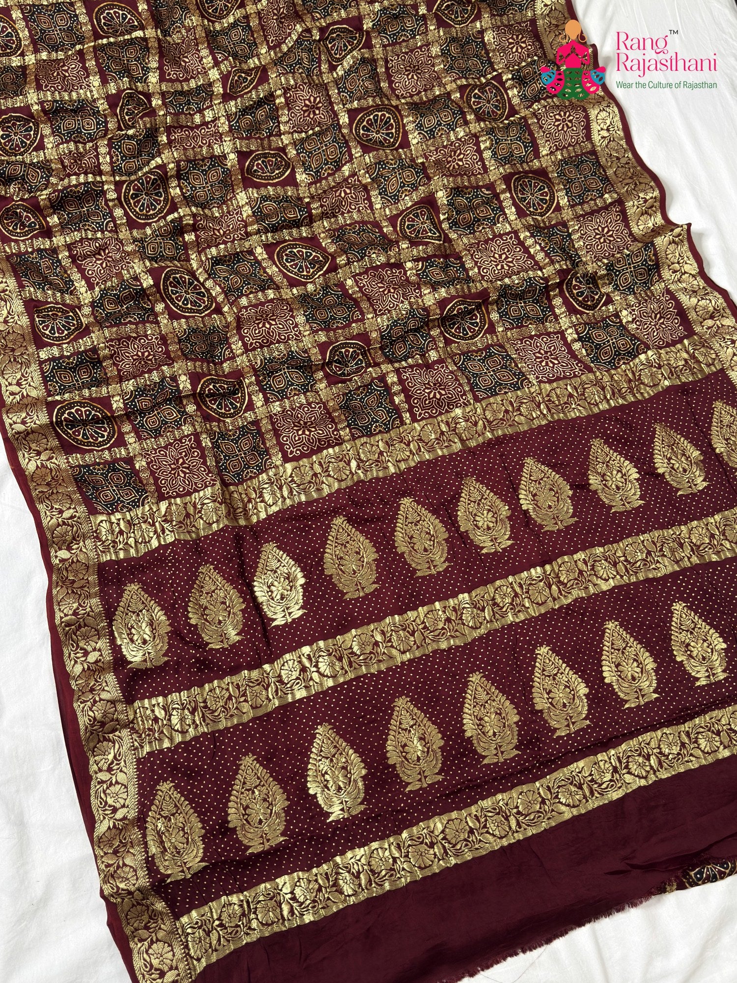 pallu detailing of maroon modal banarasi zari weave gharchola saree