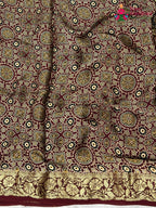 close up view of maroon modal banarasi zari weave gharchola saree