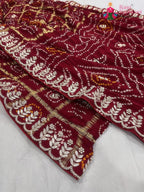 border detailing of maroon pure gajji silk gota patti saree 