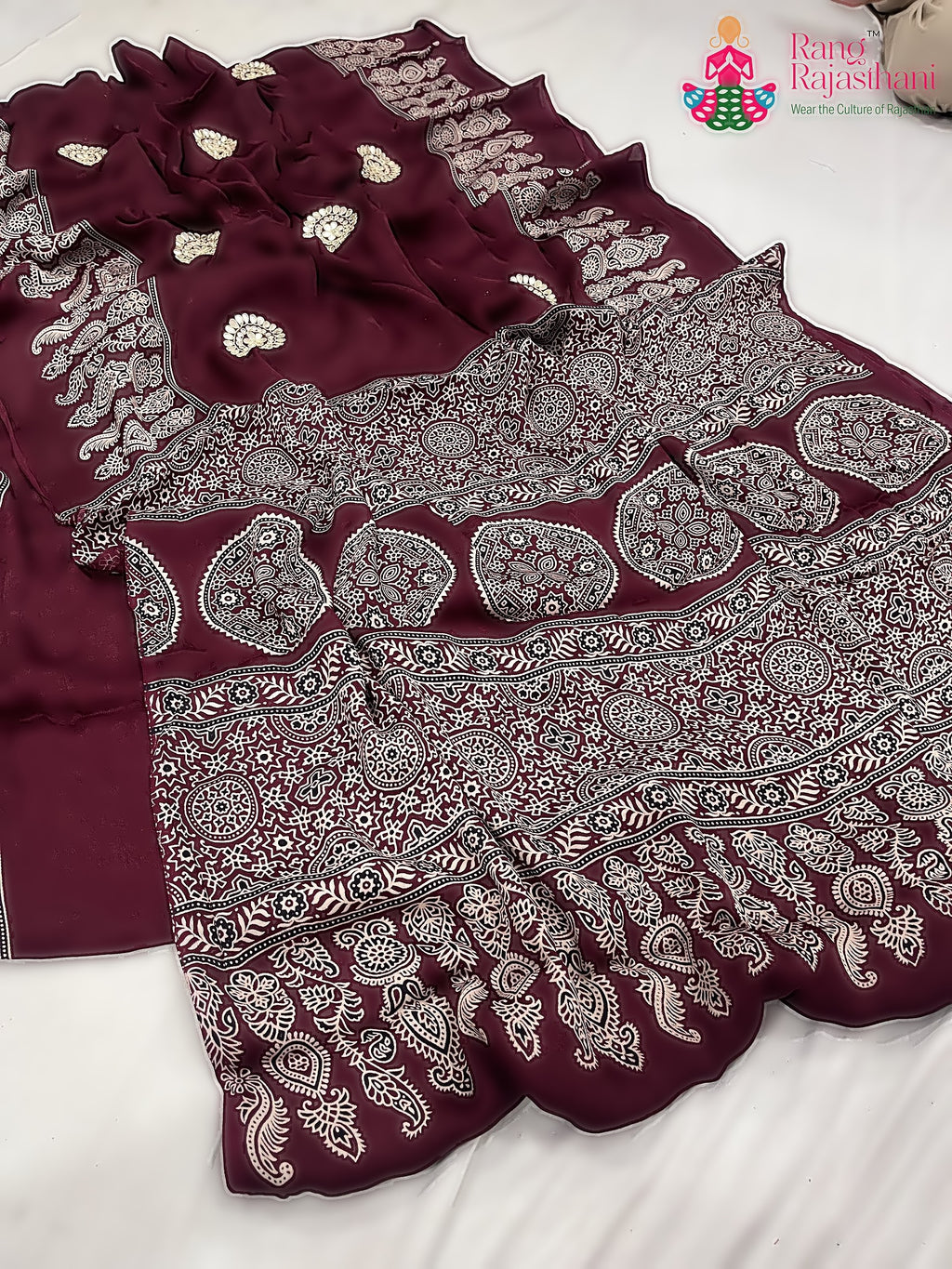 close up detailing of maroon pure modal silk ajrakh print saree 