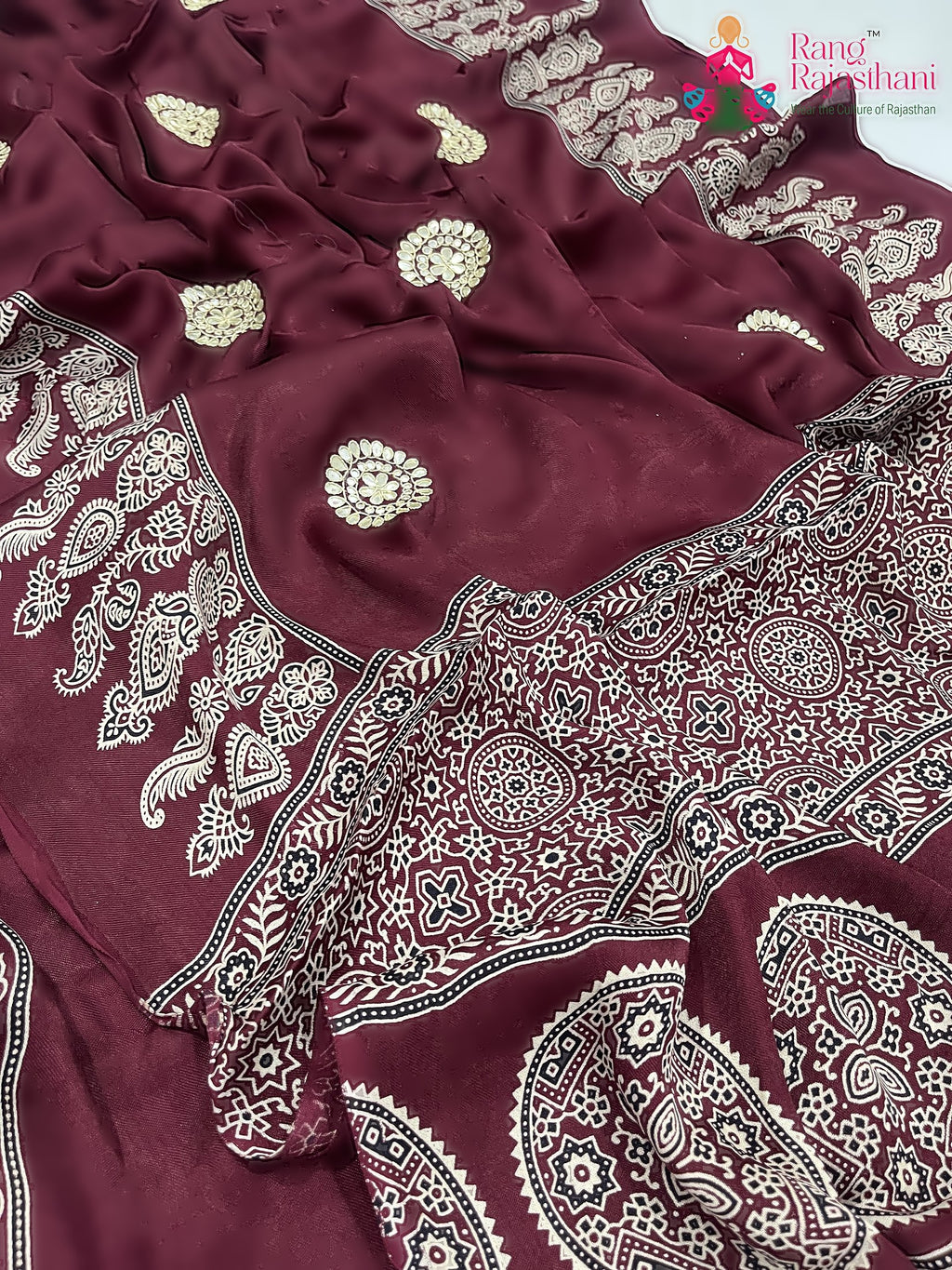 pallu detailing of maroon pure modal silk ajrakh print saree 
