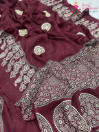 pallu detailing of maroon pure modal silk ajrakh print saree 