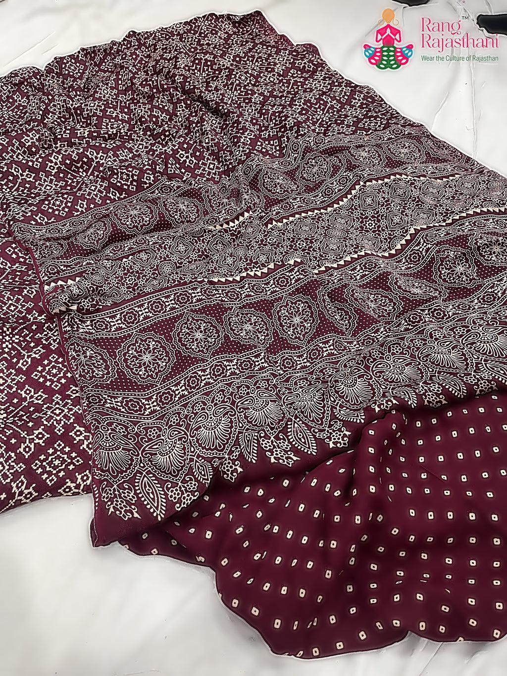 fabric texture of maroon pure modal silk ajrakh print saree 