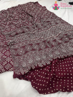 fabric texture of maroon pure modal silk ajrakh print saree 