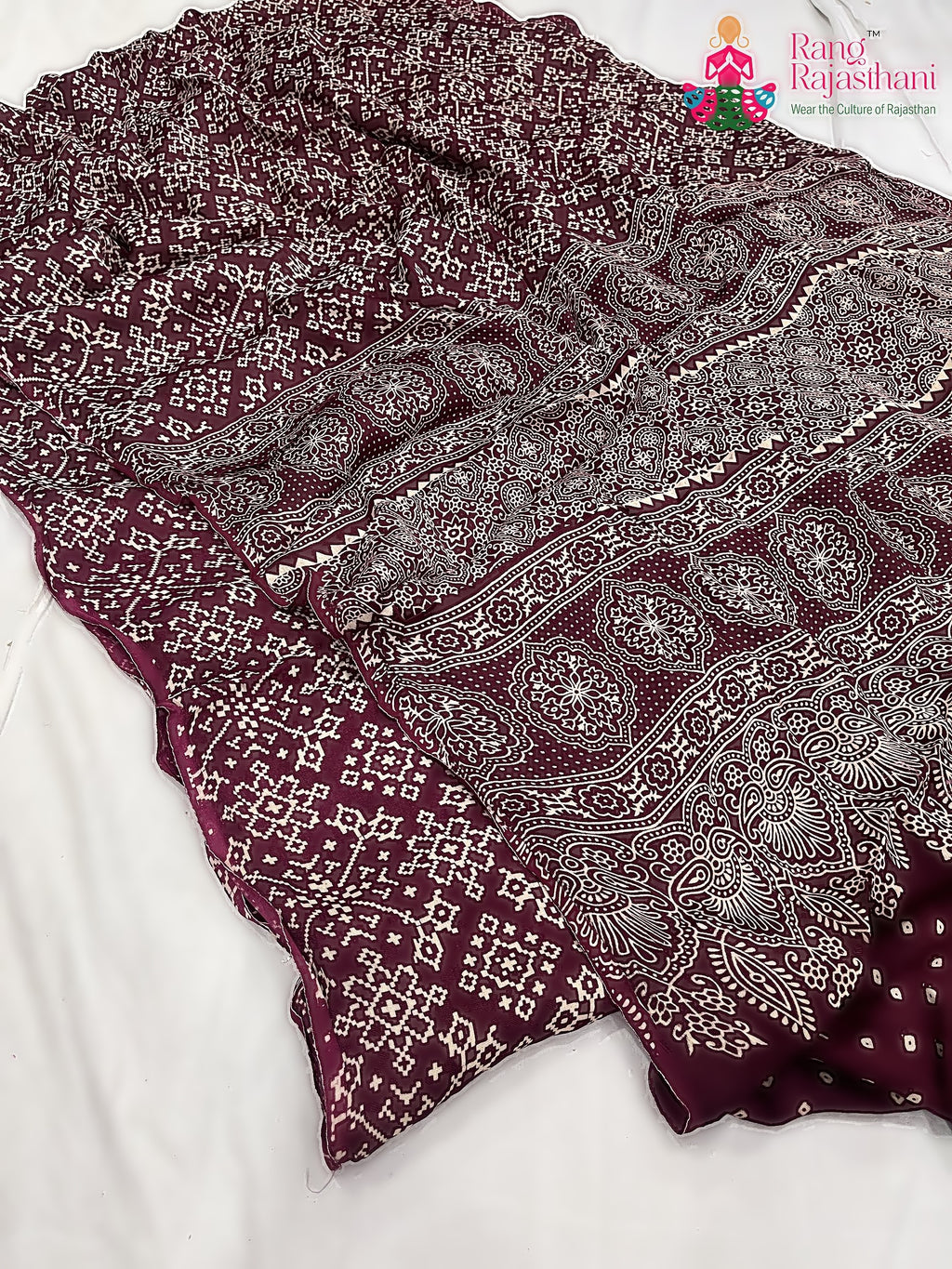 border detailing of maroon pure modal silk ajrakh print saree 