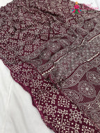 close up detailing of maroon pure modal silk ajrakh print saree 