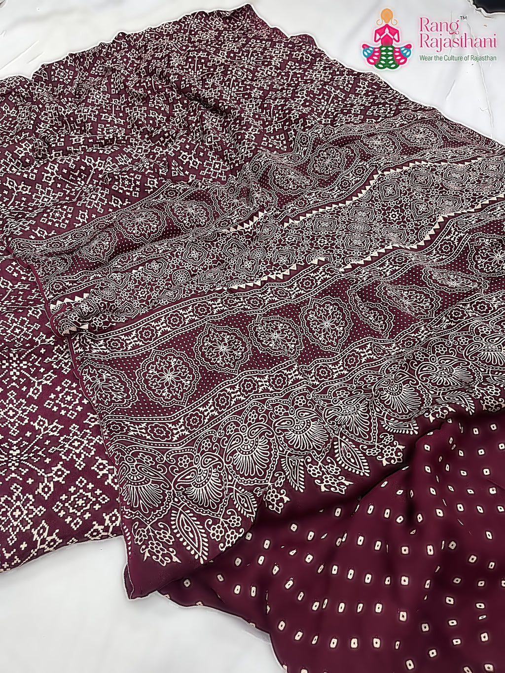 pallu detailing of maroon pure modal silk ajrakh print saree 