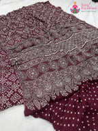 pallu detailing of maroon pure modal silk ajrakh print saree 