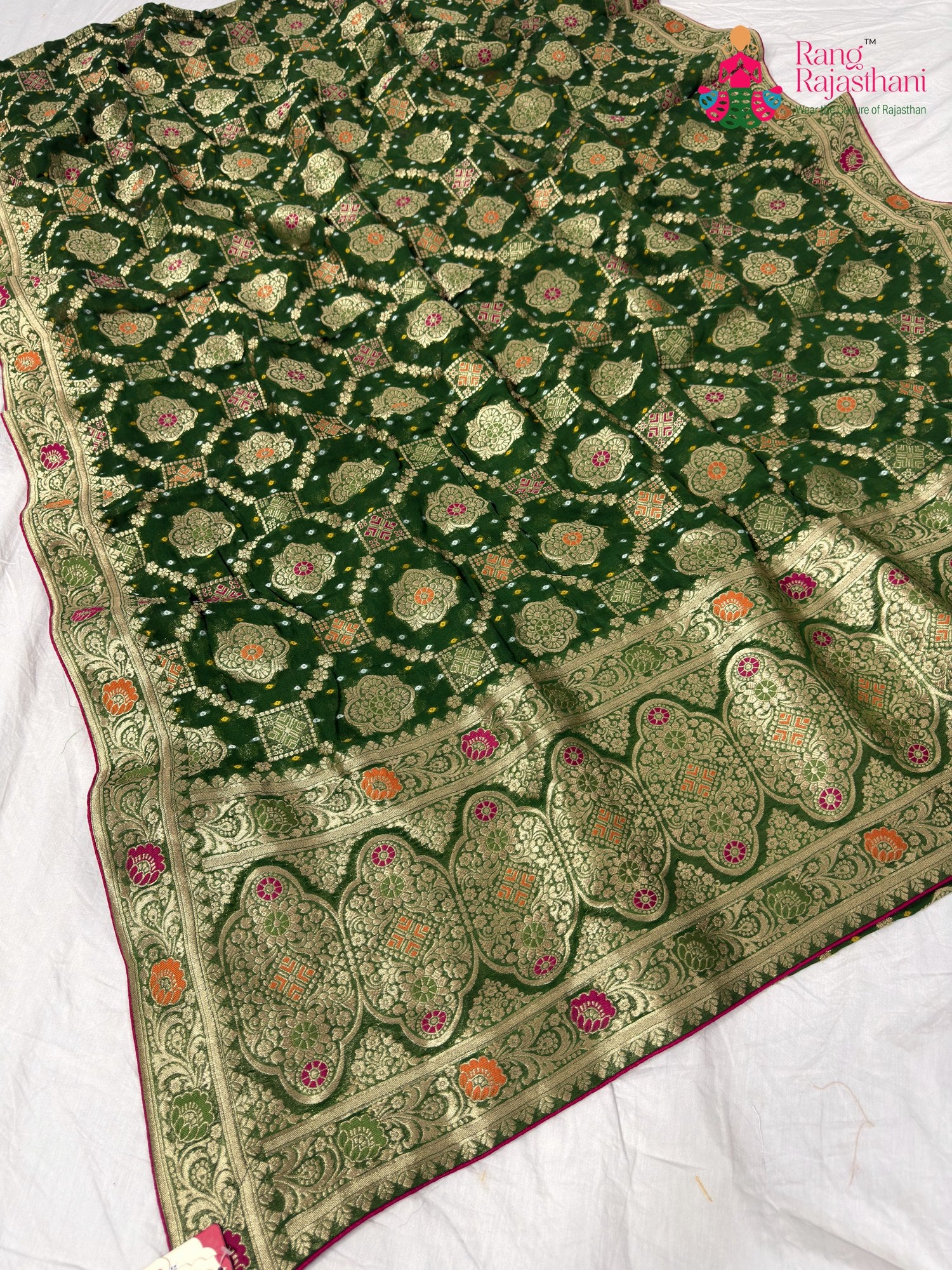border detailing of mehendi green pure georgette khaddi saree
