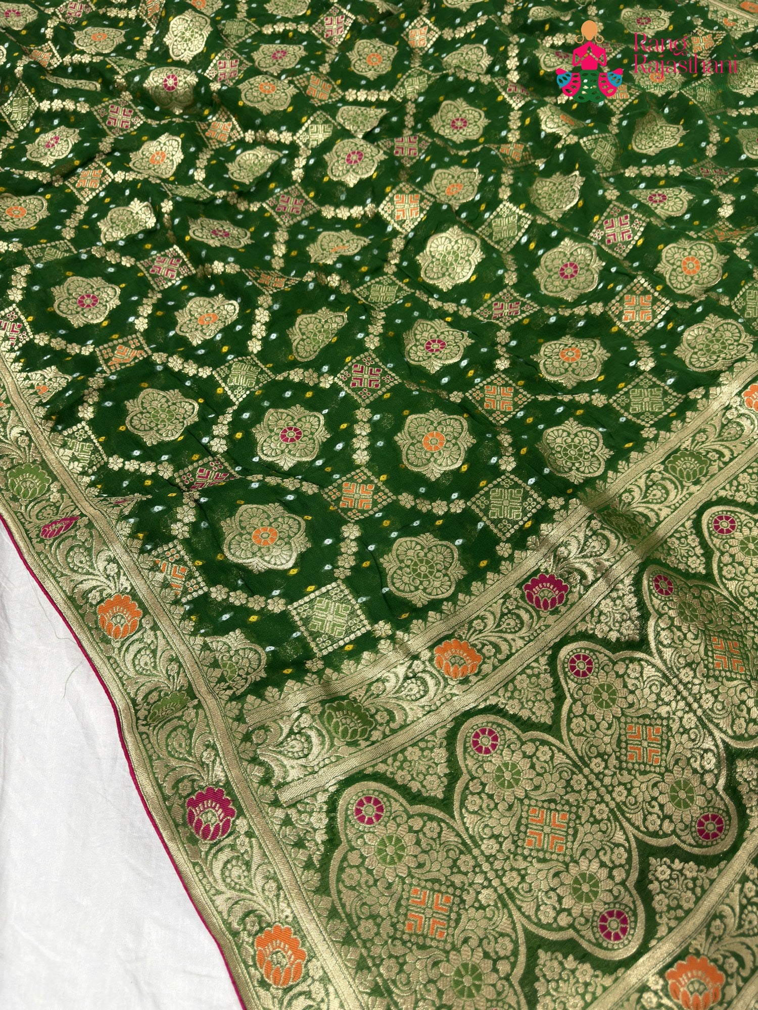 fabric texture of mehendi green pure georgette khaddi saree