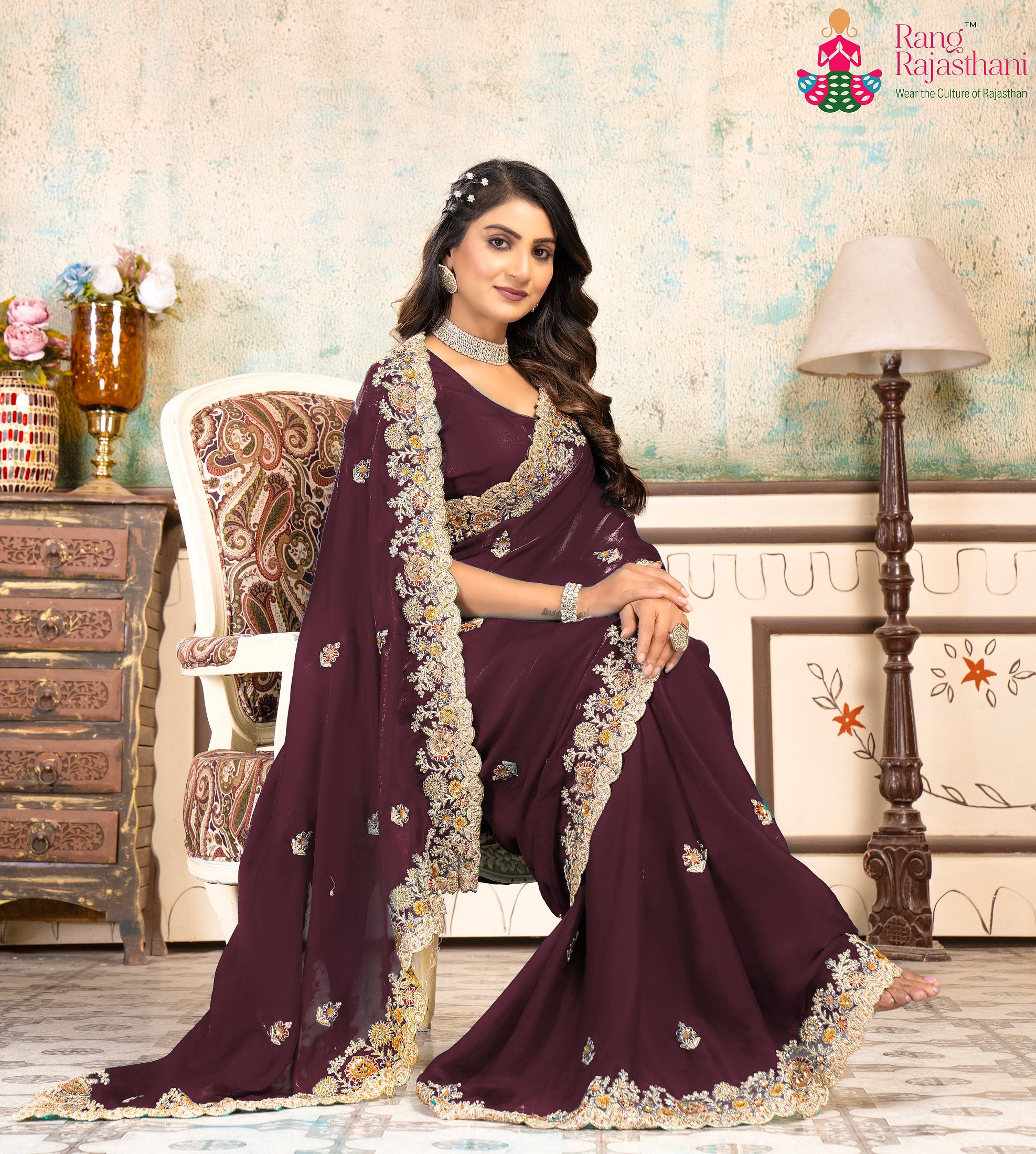 close up detailing of minimal wine chiffon saree 