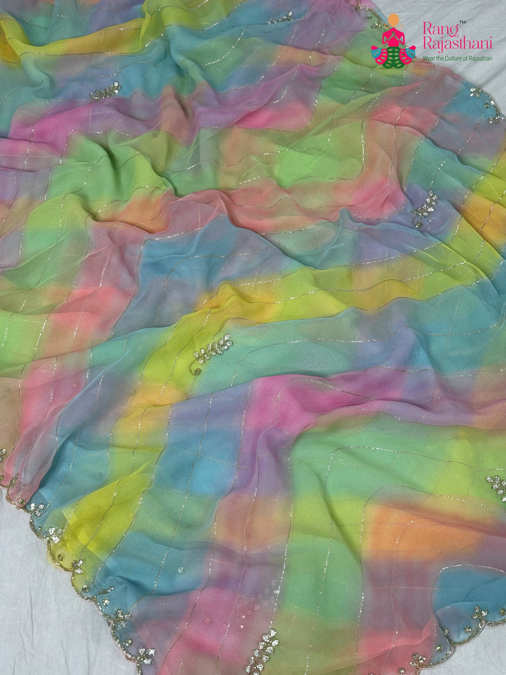 border detailing of multi fabric saree