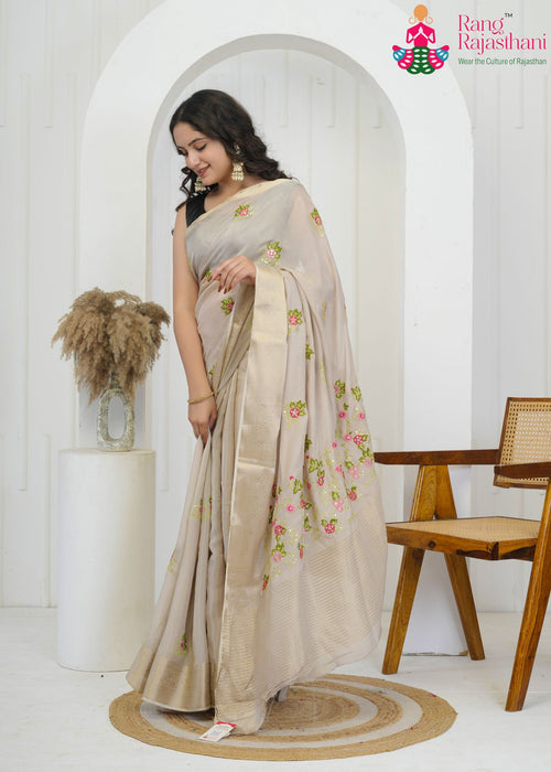 Beige Chinon saree with embroidery Butti side drape view