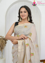 Beige Chinon saree with embroidery Butti close up detailing