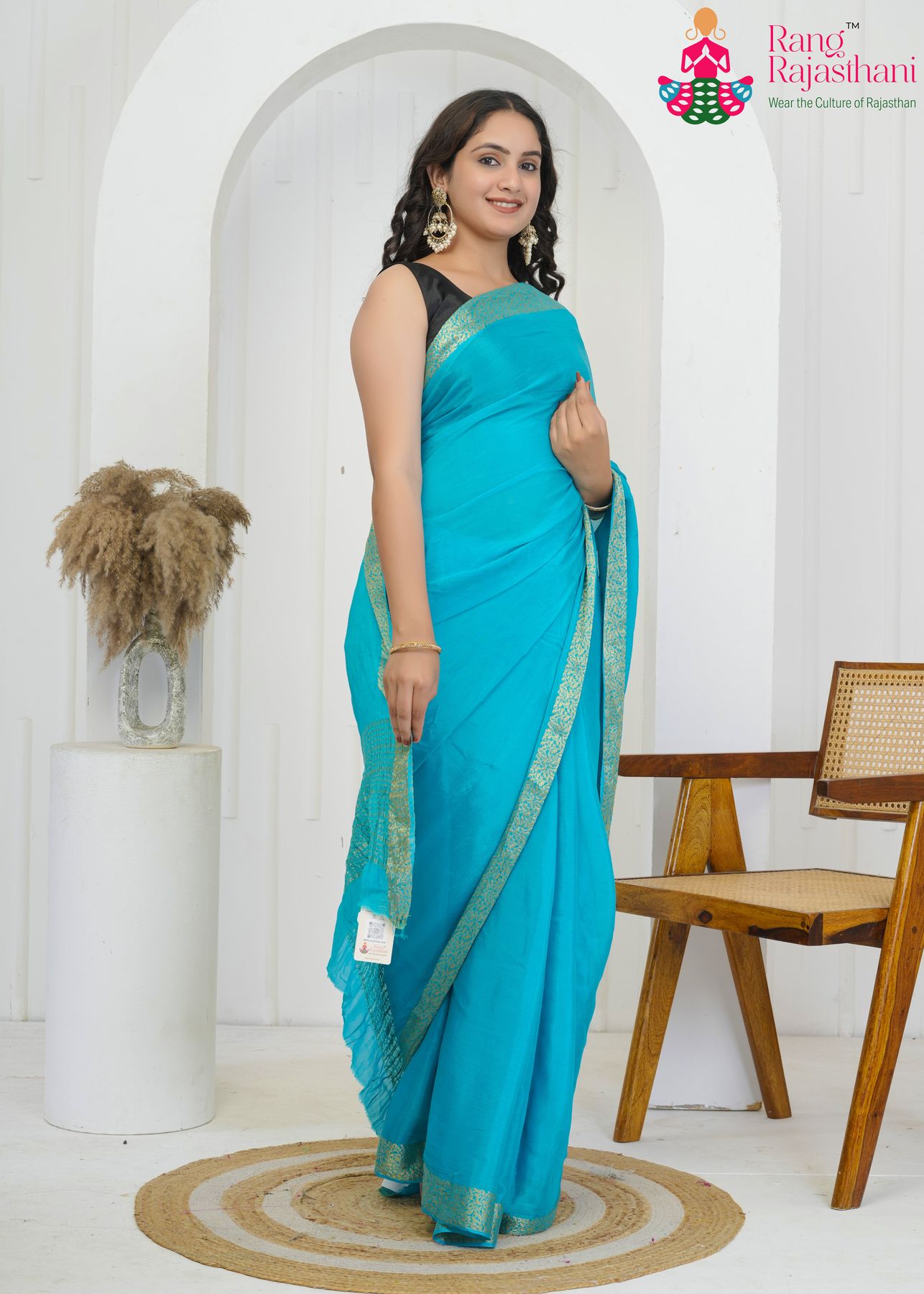 aqua firozi pure chinon saree with zari border for side drape view