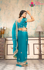 Turquoise Fendi saree with Zari Work close up detailing