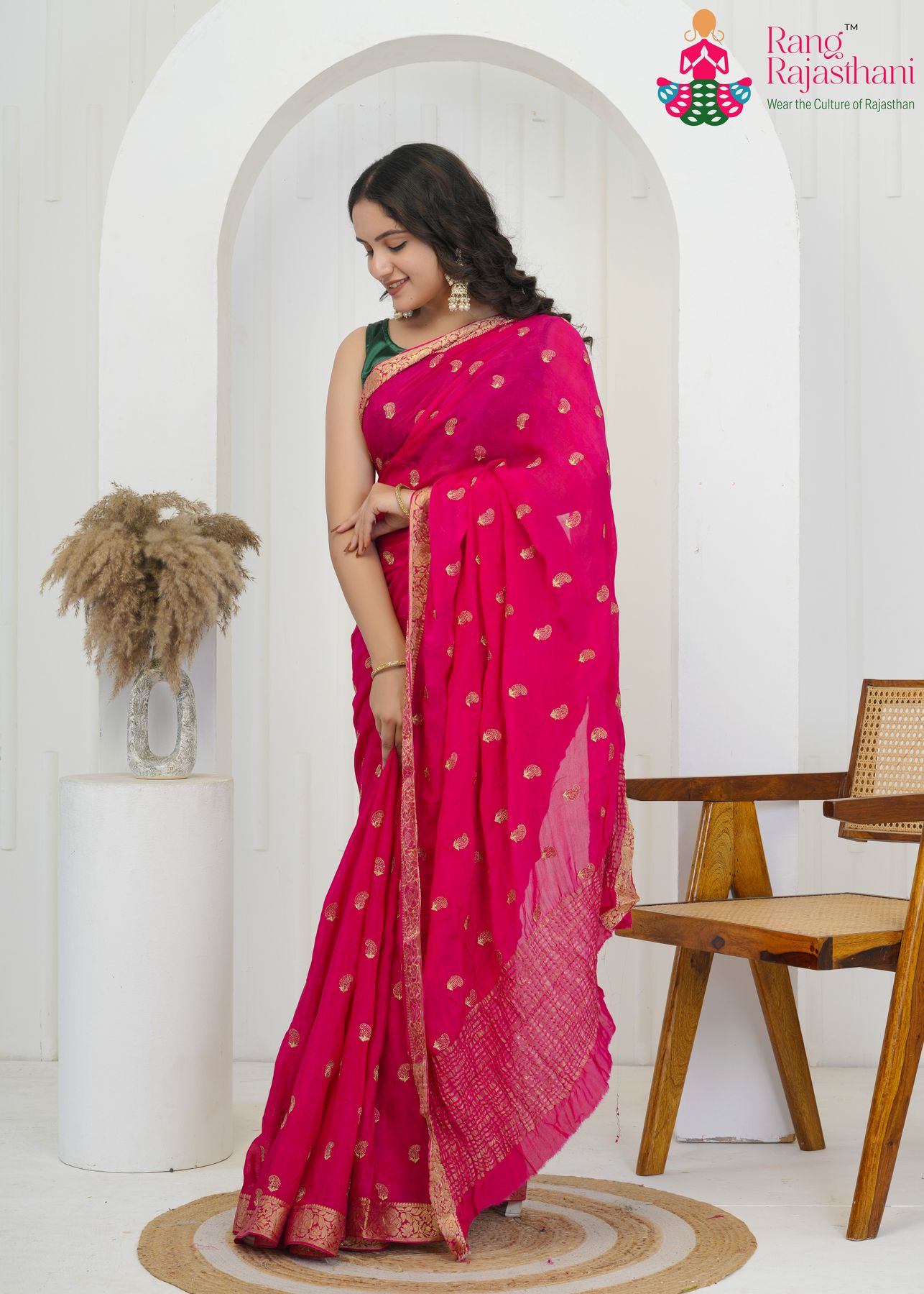 rani chinnon saree with embroidered butti and banarasi zari side drape view