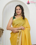 Yellow Kota Silk saree with Zari Border close up detailing