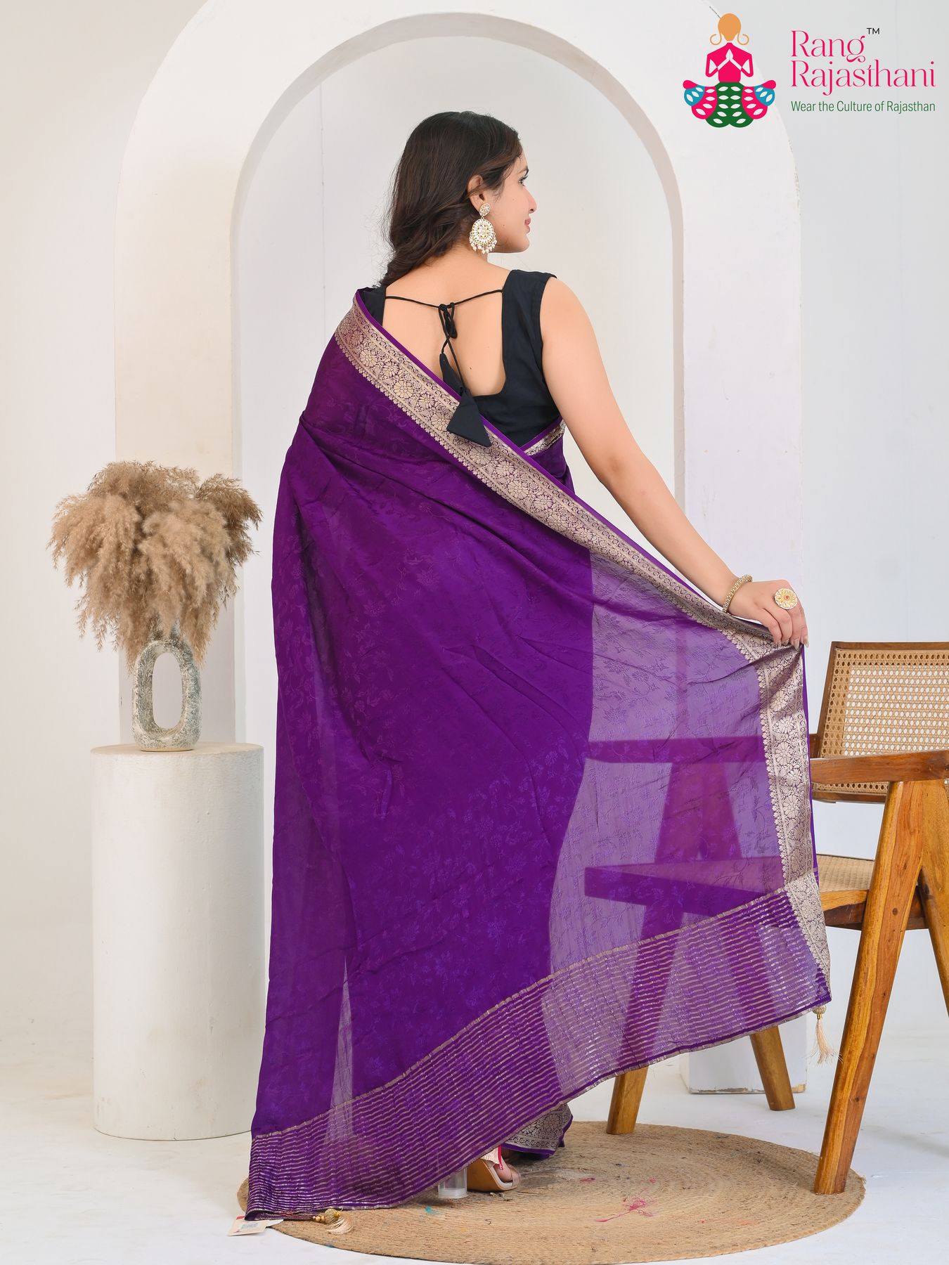 violet pure silk saree with jacquard texture for sister's side drape view