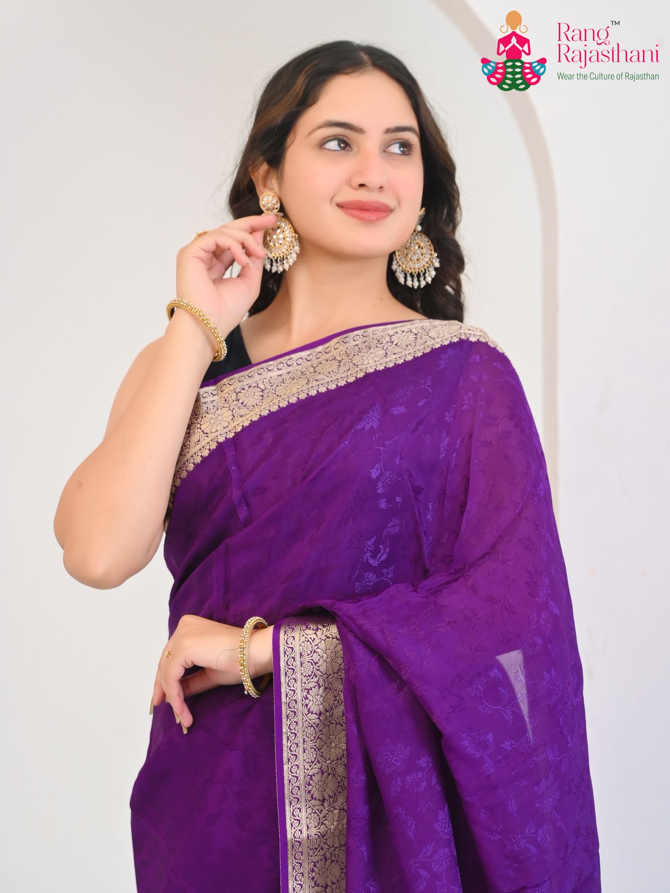 violet pure silk saree with jacquard texture for sister's wedding close-up view