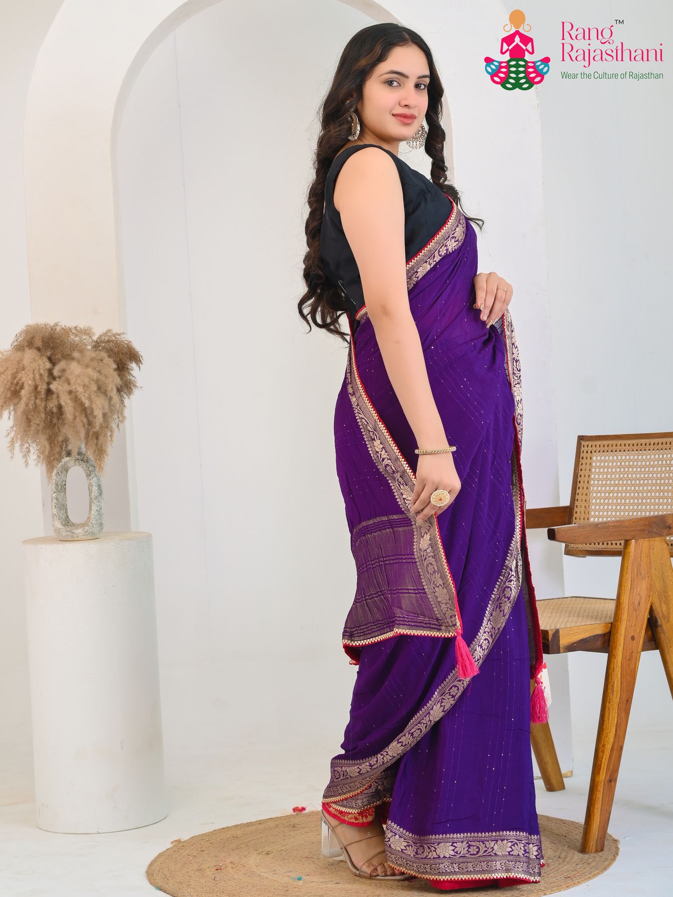 violet chinnon saree with sequence for engagement ceremony side drape view