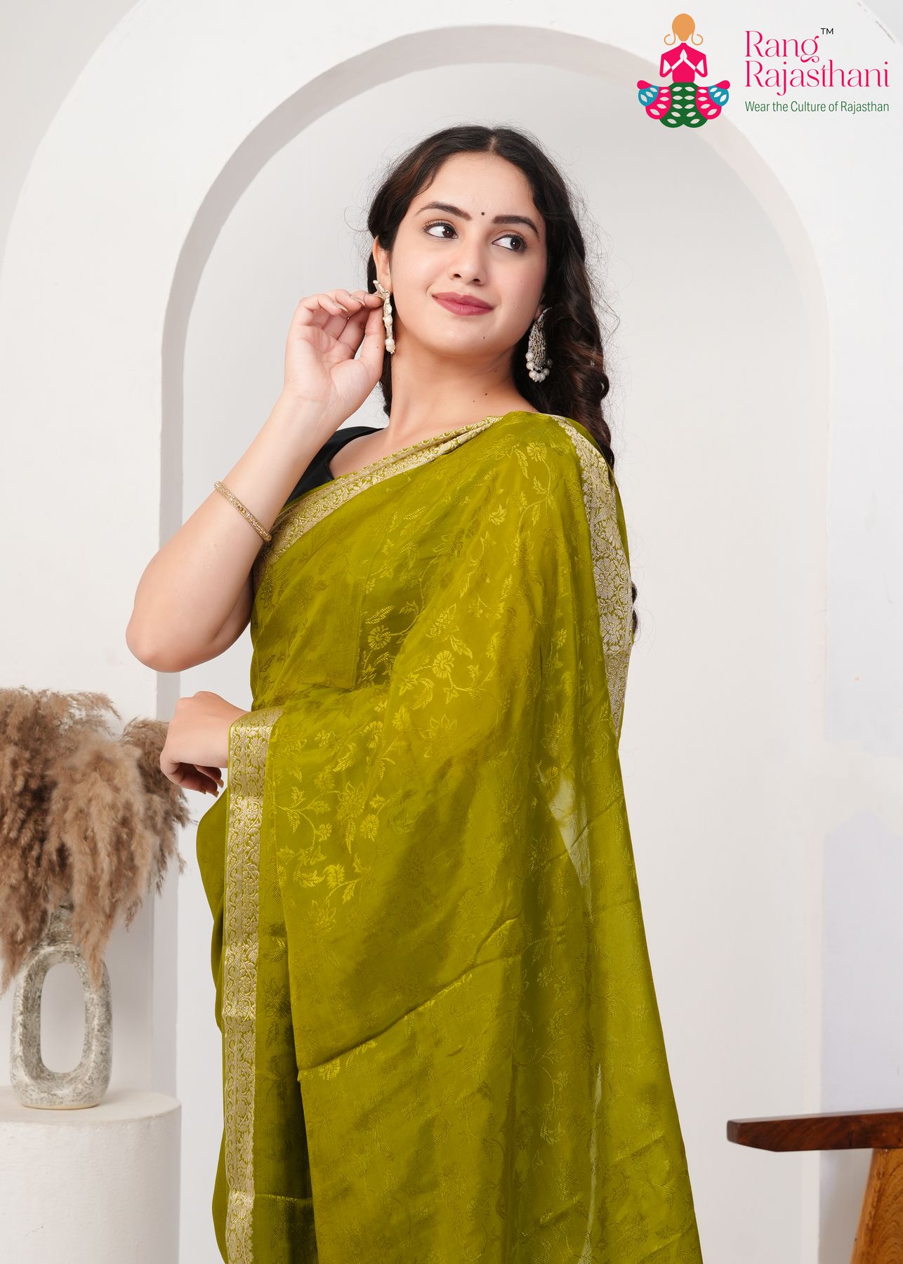 olive pure silk saree with jacquard for festive celebration close-up view