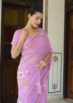 Purple Synthetic Georgette saree with Hand Brush Print close up detailing