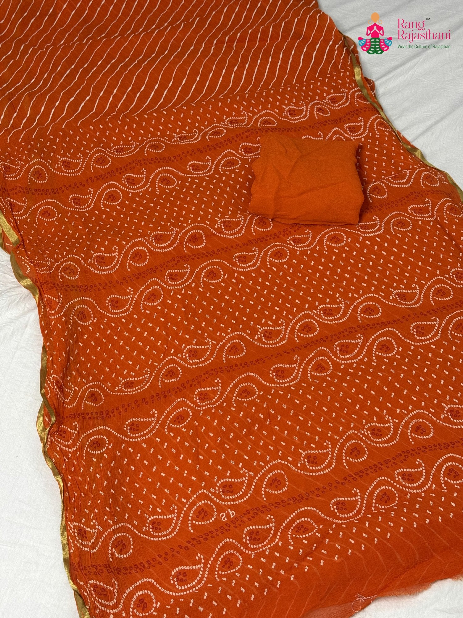 pallu detailing of orange chiffon saree