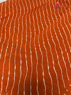 design pattern of orange chiffon saree