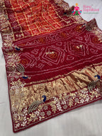 close up detailing of orange gajji silk hand embellishment saree