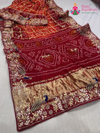 border detailing of orange gajji silk hand embellishment saree