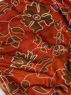 close up view of orange pure russsian silk bandhani saree