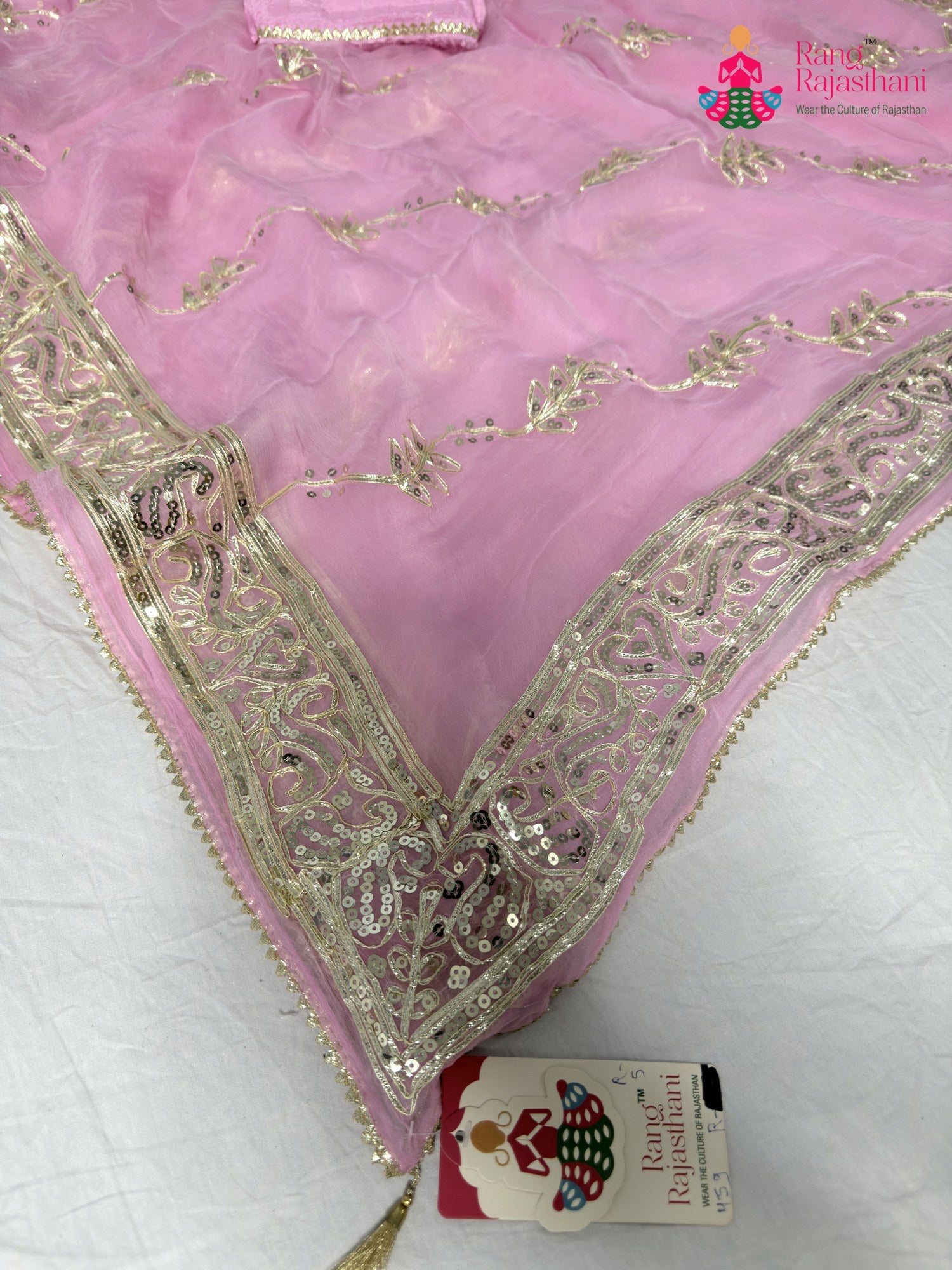 pallu detailing of pink chiffon gota patti saree