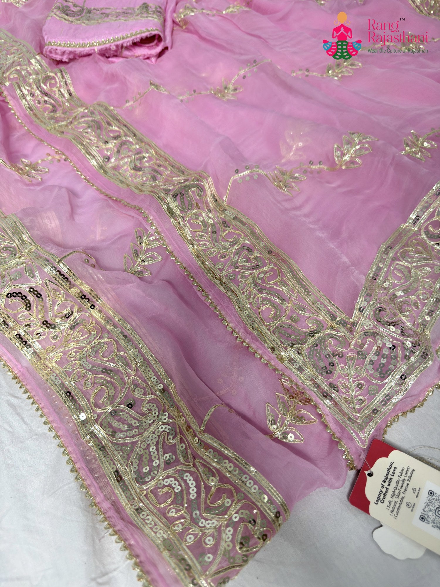 border detailing of pink chiffon gota patti saree
