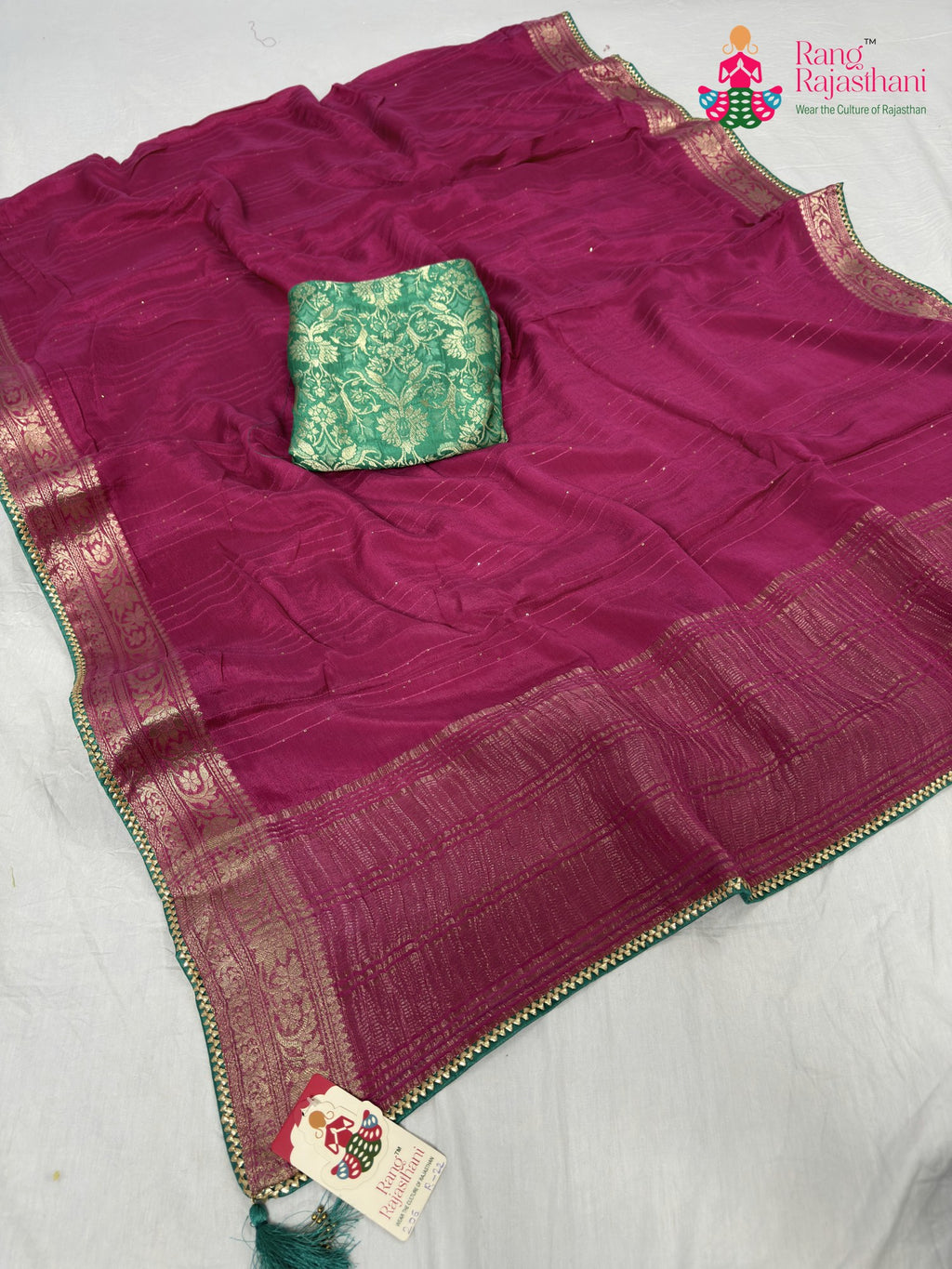 pallu detailing of pink chinnon saree