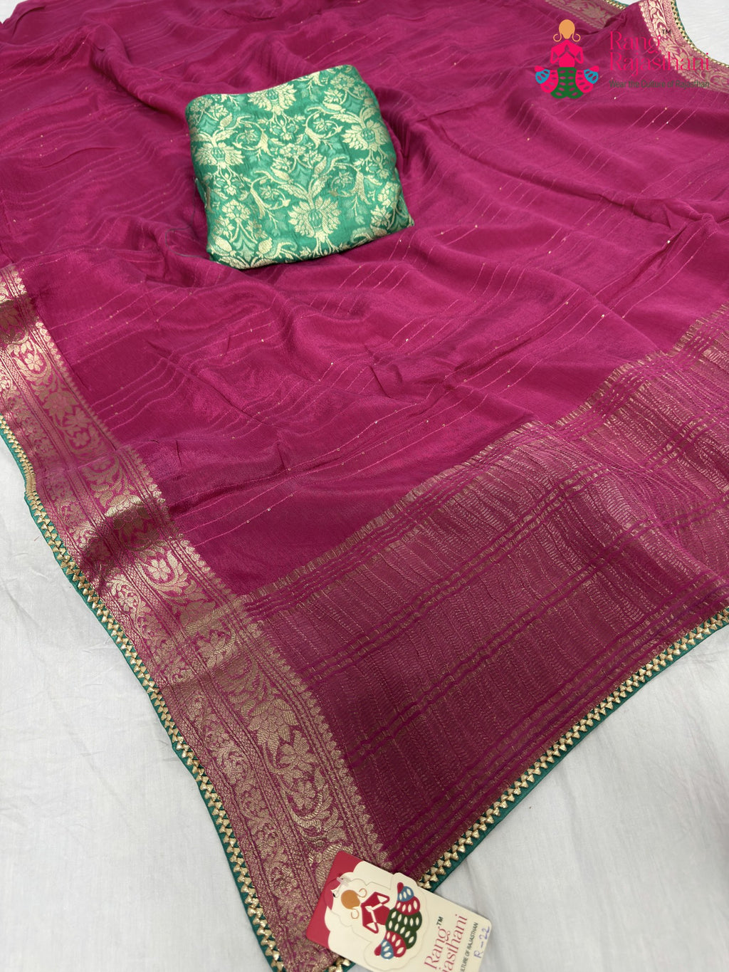 close up detailing of pink chinnon saree